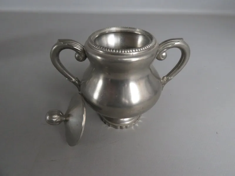 Verzilverd koffieservies