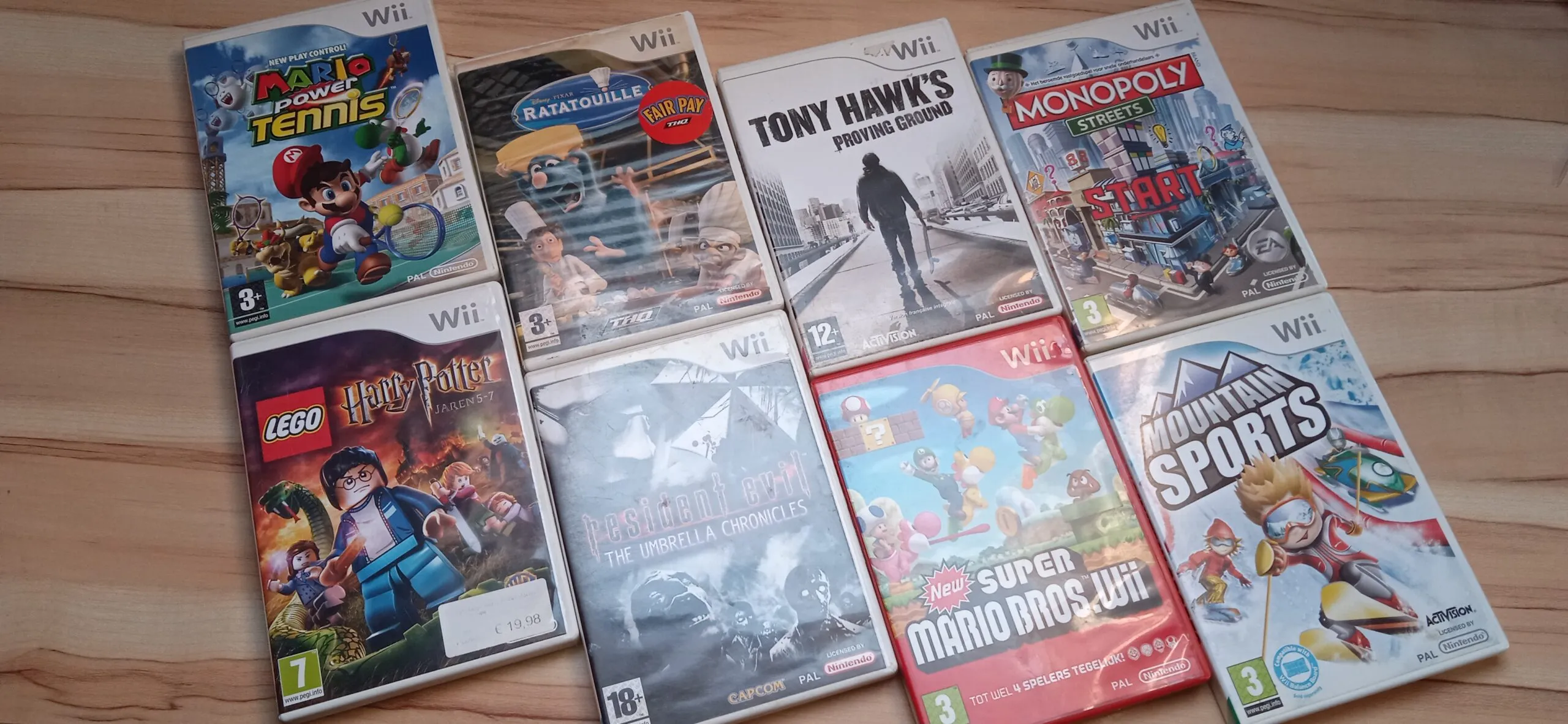 Nintendo Wii + 2 controllers + 2 nunchuks + 8 spelletjes